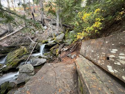 Wooden bench next to the creek